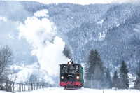 Taurachbahn mit Dampflokomotive im Winter