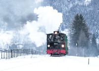 Taurachbahn mit Dampflokomotive im Winter